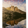 best of kvc Cover of "The Best of the Kawuneeche Valley: A Rocky Mountain National Park Insider’s Guide" shows a rocky mountain landscape mirrored in a tranquil lake beneath a partly cloudy sky.