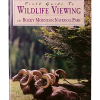 field guide to wildlife Cover of "Field Guide to Wildlife Viewing in Rocky Mountain National Park," showing four bighorn sheep resting beneath a tree.