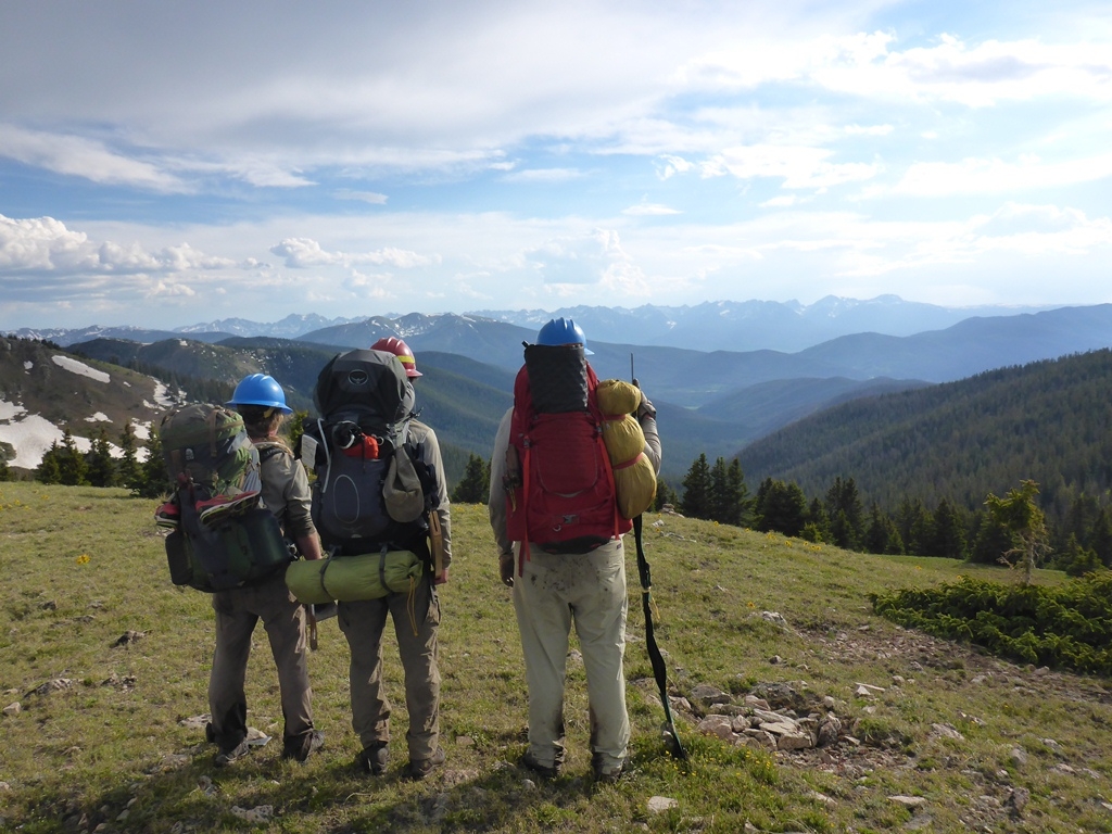 A group of hikers on a mountain.