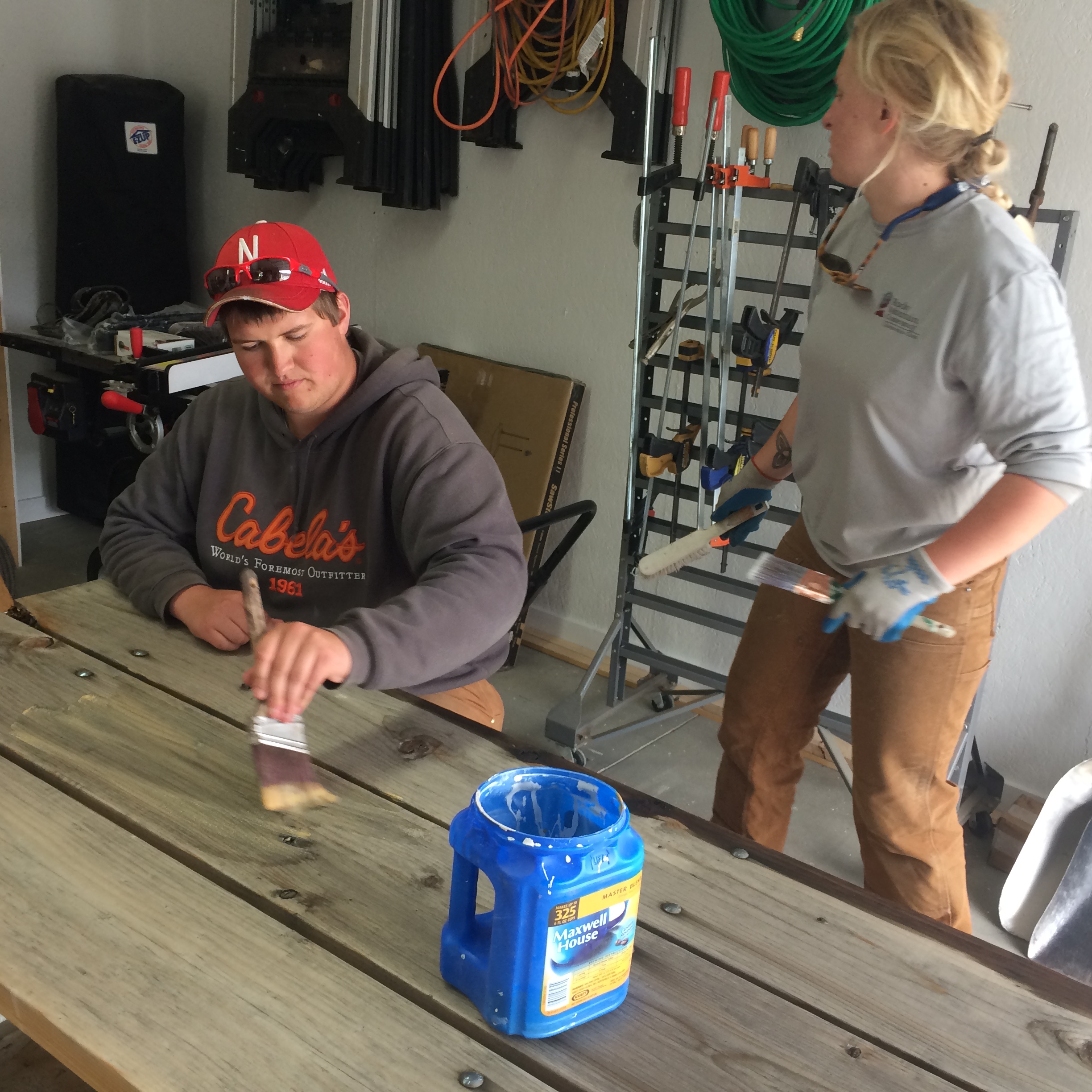 Two people working on a woodworking project