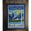 Patch - RMNP Bear Lake: Embroidered patch showcasing Bear Lake with mountains, trees, and a lake at Rocky Mountain National Park. Text reads: "Rocky Mountain National Park, Scenic Icon Series, Bear Lake.