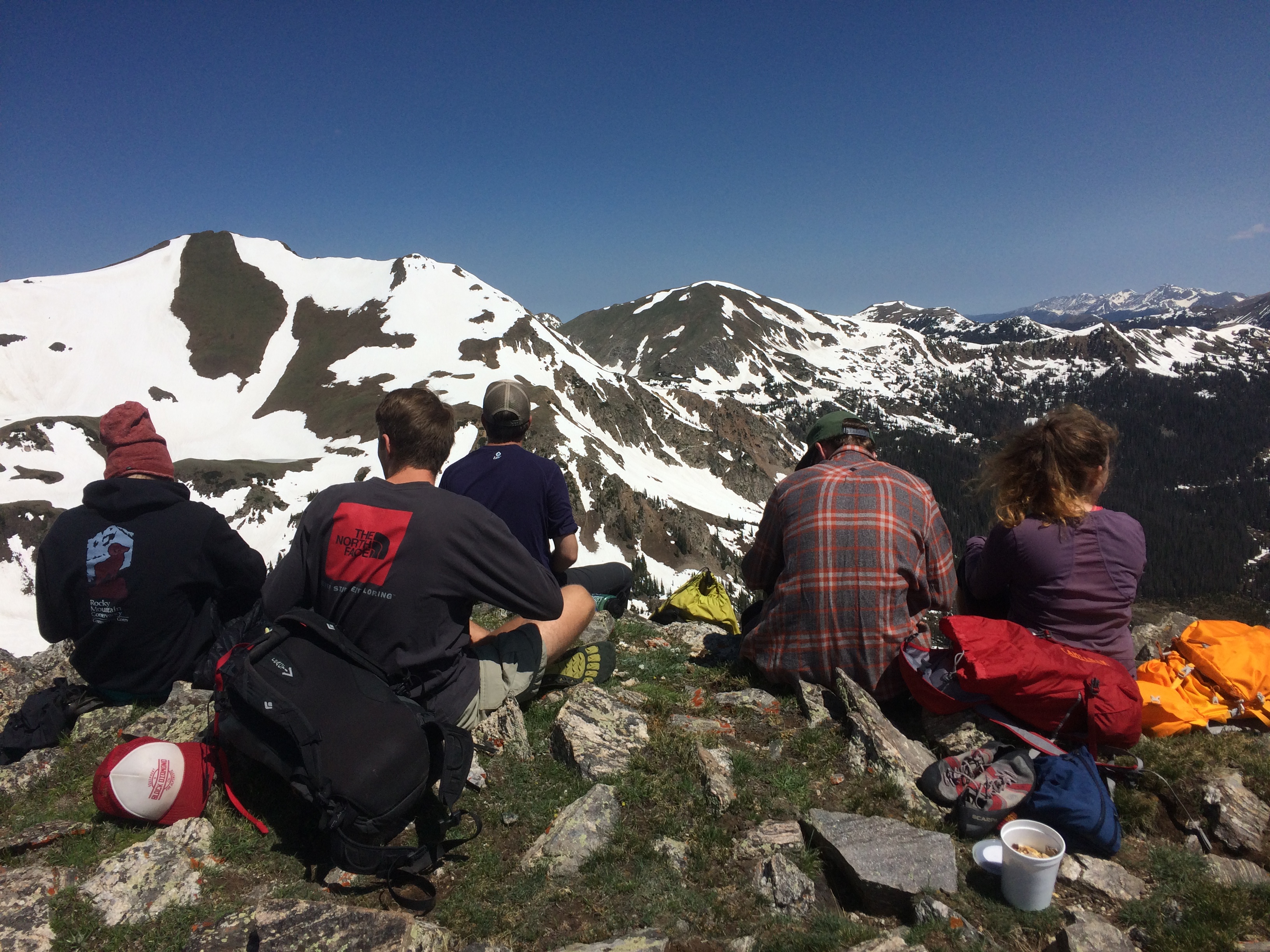 Hikers resting at the top of the mountain