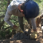 A man wearing a hard hat.