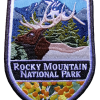Collector elk Magnet Embroidered "RMNP Patch" magnet portraying a deer, trees, mountains, and colorful flowers.