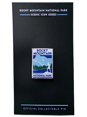 A collectible "RMNP Scenic Icon Series" pin featuring mountains and trees is displayed on a black card.