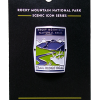 TRR Medallion The Walking Stick Medallion features a scenic view of Trail Ridge Road in Rocky Mountain National Park, with mountains and a winding road, as part of the Scenic Icon Series.