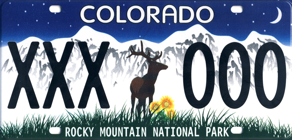 Colorado license plate with a deer and mountains.