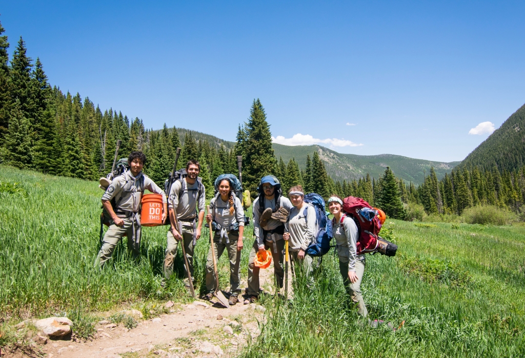 A group of hikers on a trail.