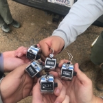 A group of people holding a bunch of keys.