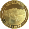 A Collectible Coin - RMNP Gold Ram with the words longs peak on it.