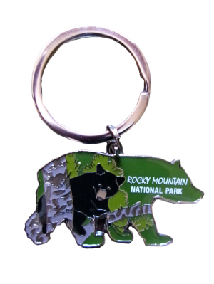 Bear-shaped keychain titled "Keychain - RMNP Bear" displays a bear cub and the text "Rocky Mountain National Park" on a green background.