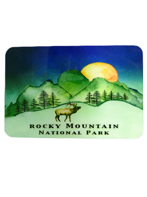 Rocky Mountain National Park illustration on the Magnet - RMNP Night Sky Elk features mountains, a setting sun, trees, and an elk in the foreground.
