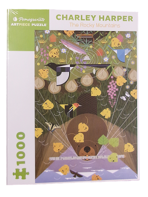Charley Harper's "The Rocky Mountains" puzzle box, showcasing stylized animals and nature elements, includes 1000 pieces.