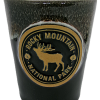 Black ceramic shot glass featuring the Rocky Mountain National Park emblem with an elk and text.