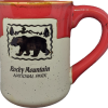 A coffee mug with a RMNP Bear Scene on it.