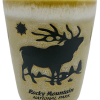 Beige shot glass featuring an elk silhouette and the text "Rocky Mountain National Park.