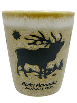 Beige shot glass featuring an elk silhouette and the text "Rocky Mountain National Park.