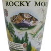 Rocky Mountain National Park souvenir shot glass, known as the Shot Glass - RMNP Map Blue Xplorer, showcases a map, mountain illustration, and park emblems.