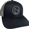 A black trucker hat with a Mountain Circle logo on it.