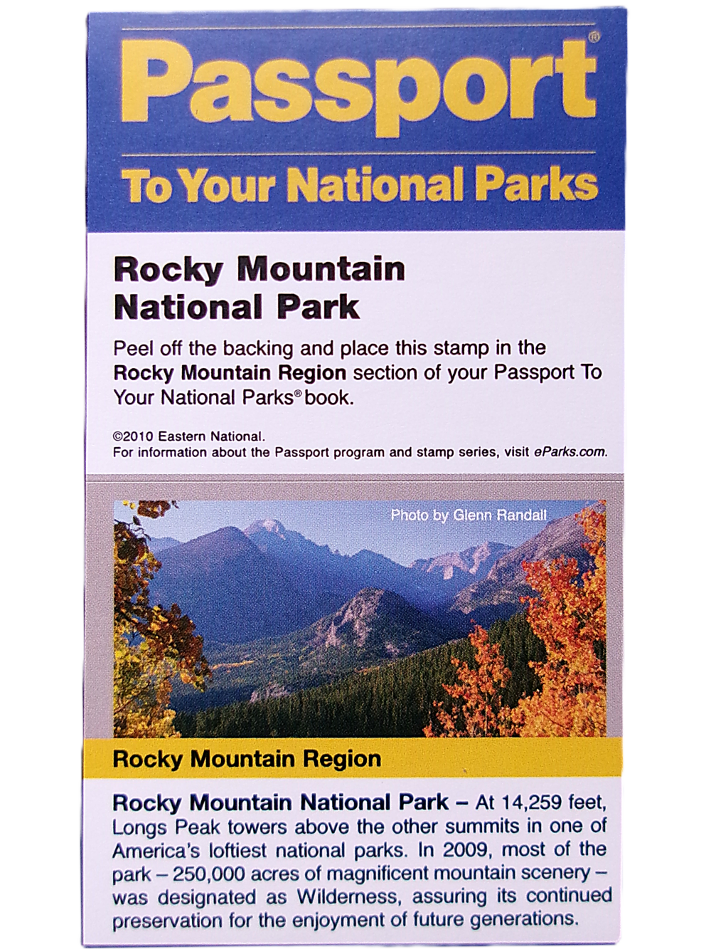 Sticker - RMNP Passport Stamp brochure includes a landscape photo of Rocky Mountain National Park's mountains and autumn foliage, along with details about the park and visitor statistics.