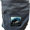 The Mountain Elk Drawstring Backpack with an image of a moose on it.
