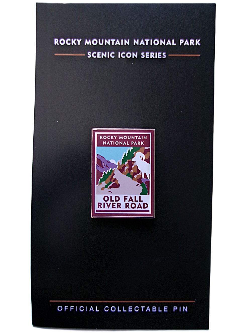 Part of the Scenic Icon Series, this collectible pin showcases Rocky Mountain National Park's Old Fall River Road with a mountain goat and landscape, set against a black card. Product: Pin - RMNP Old Fall River Road.