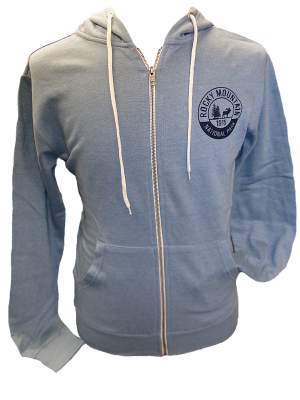 Light blue "Sweatshirt - RMNP Zip-Up Blue" featuring white drawstrings and a "Rocky Mountain National Park 1915" emblem on the left chest.