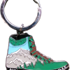 Keychain labeled “RMNP Hiking Boot” features a mountain scene shaped like a hiking boot.