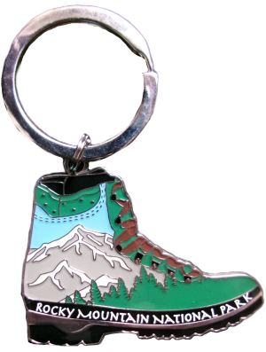 Keychain labeled “RMNP Hiking Boot” features a mountain scene shaped like a hiking boot.