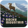 Coaster - RMNP Bighorn Columbine displays a bighorn sheep on a hillside with purple flowers, framed by snow-capped mountains.