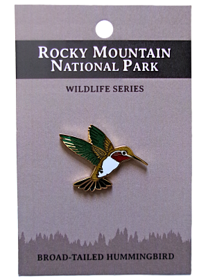 A pin from the RMNP North American Wildlife Series features a broad-tailed hummingbird.