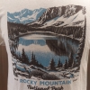 Close-up of the back of the T-Shirt - RMNP Mills Lake featuring an illustration of a lake surrounded by mountains and trees, with the text "Rocky Mountain National Park" at the bottom.
