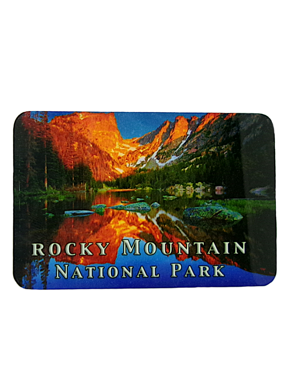 A scenic image of Dream Lake in Rocky Mountain National Park at sunset reflects mountains and trees. Text reads "Rocky Mountain National Park." Product Name: Magnet - RMNP Dream Lake.
