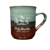 Copper mug 2 Product Description: A "Mug - RMNP Mod Collage (Copy)" ceramic mug showcasing the text "Rocky Mountain National Park" alongside an image of mountains, trees, and an elk set against a green and brown backdrop.