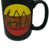 Black Mug - RMNP Elk Logo featuring a stylized elk, tree, and mountain design with "Rocky Mountain National Park" text on a circular red, orange, and yellow background.