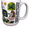 White "Mug - RMNP Mod Collage" featuring "Rocky Mountain National Park" text and colorful illustrations of a butterfly, bear, fish, flower, and mountains.