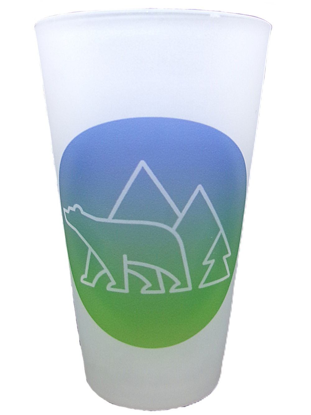 The Glass - RMNP Pint Bear Logo features a white outline of a bear, pine tree, and two mountains on a frosted cup with a blue and green circular background.