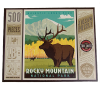 A 500-piece puzzle named "Puzzle - Fall Bull Elk," showing an elk before mountains and trees, labeled Rocky Mountain National Park; finished size measures 18 x 24 inches.