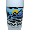 mtn crew tumbler An insulated tumbler featuring a watercolor graphic of mountains, trees, and sun, labeled "Insulated Tumbler - Watercolor Mountains.