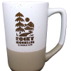speckled retro mug The Mug - RMNP Speckled Retro is a ceramic two-tone mug featuring a tree, mountains, and sun graphic above the text "Rocky Mountain National Park.