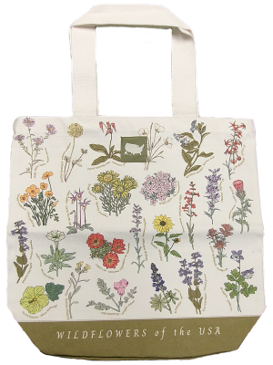 The Tote Bag - Wildflowers of the USA features illustrated wildflowers and plants, with "WILDFLOWERS of the USA" printed at the bottom.