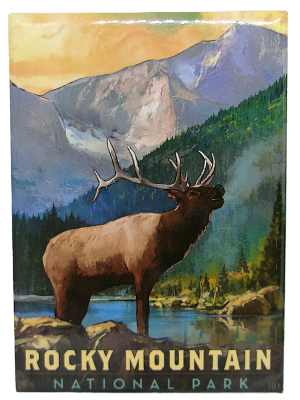 A colorful magnet features a bull elk by a lake with pine trees and mountains, inspired by Rocky Mountain National Park. Text reads, "Rocky Mountain National Park.