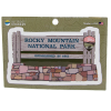 Sticker - RMNP Entrance Sign: A sticker featuring the wooden entrance sign for Rocky Mountain National Park with "Established in 1915," displayed on a green "My Travel Stickers" card.