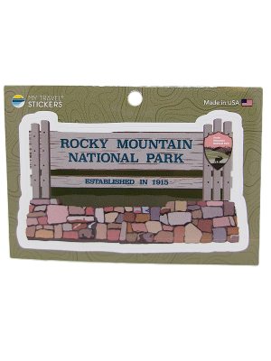 Sticker - RMNP Entrance Sign: A sticker featuring the wooden entrance sign for Rocky Mountain National Park with "Established in 1915," displayed on a green "My Travel Stickers" card.
