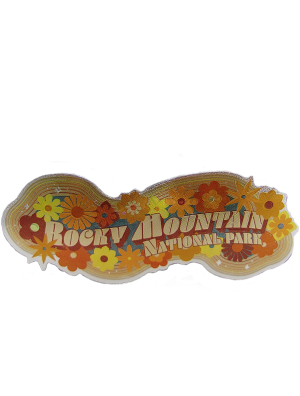 Foil Retro Flower sticker featuring "Rocky Mountain National Park" in bold letters, accented with orange, yellow, and brown flowers on a white background.