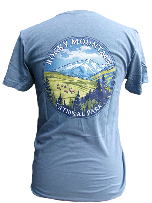 Person wearing a blue "T-Shirt - RMNP Meadow Elk" featuring a circular Rocky Mountain National Park graphic with mountains, trees, and wildlife on the back.