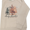 Sweatshirt - RMNP Fall Trees Crewneck in light beige featuring a graphic of trees and mountains with “Rocky Mountain National Park” printed on the front.